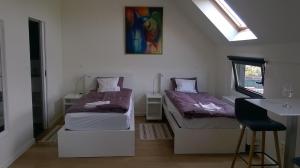 Postel nebo postele na pokoji v ubytování B&B Wannes Suite