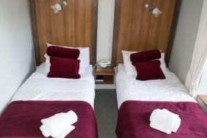 Letto o letti in una camera di Ravine Hotel