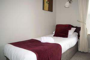Letto o letti in una camera di Ravine Hotel