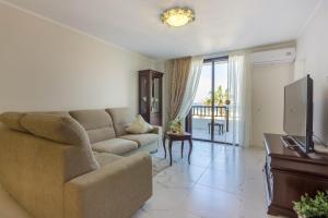 TV a/nebo společenská místnost v ubytování Front Line Parque Santiago 2 Lux Apartament