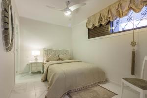 Postel nebo postele na pokoji v ubytování Front Line Parque Santiago 2 Lux Apartament + 10 fotografií