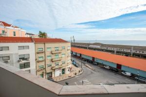 an overhead view of a city street with buildings at Apolónia 3E Five Bedrooms in Lisbon