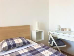 Postel nebo postele na pokoji v ubytování Apartment Qualich