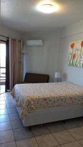 Posteľ alebo postele v izbe v ubytovaní Condomínio Estrela do Mar