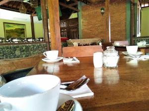 A restaurant or other place to eat at Java Village Resort by HOMEE Yogyakarta