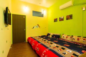 Televiisor ja/või meelelahutuskeskus majutusasutuses Time Travelodge Homestay +37 fotot