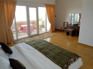 A bed or beds in a room at Lana Villa