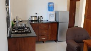 Kuchyň nebo kuchyňský kout v ubytování Park Lane Apartments