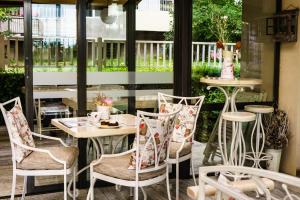 A balcony or terrace at Milano Hotel