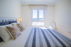 Katil atau katil-katil dalam bilik di Flower Beach Suite 26 +14 gambar