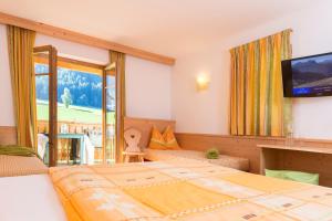 Voodi või voodid majutusasutuse Hotel Lindnerhof toas