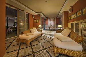 A seating area at Marrol's Boutique Hotel