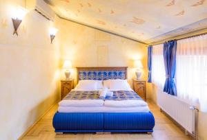 Posteľ alebo postele v izbe v ubytovaní Hotel Elite Prague