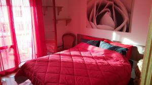 Ένα ή περισσότερα κρεβάτια σε δωμάτιο στο B&B Verrazzano affittacamere