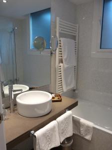Ванная комната в Hotel & Spa Xalet Bringue