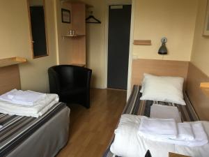 Postel nebo postele na pokoji v ubytování Vandrarhem Svanen