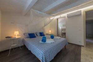 Postel nebo postele na pokoji v ubytování Villa Unica Terrazzo Sul Mare