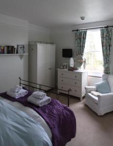 Ένα ή περισσότερα κρεβάτια σε δωμάτιο στο Winton House