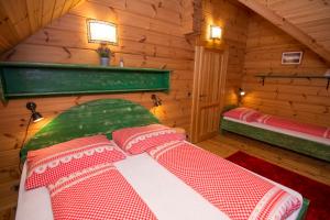 Posteľ alebo postele v izbe v ubytovaní Villa Buky