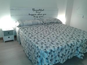 Postel nebo postele na pokoji v ubytování Apartamento Avenida Portugal-Espolon