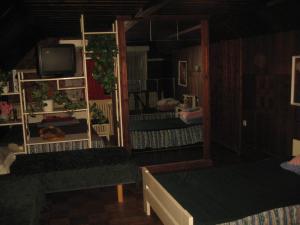Voodi või voodid majutusasutuse Tammekännu Holiday House toas