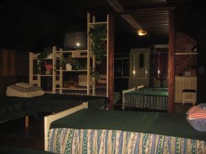 Voodi või voodid majutusasutuse Tammekännu Holiday House toas