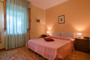 Postel nebo postele na pokoji v ubytování Hotel Relais Valle Orientina