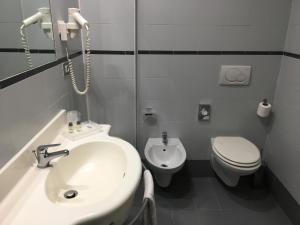 Koupelna v ubytování L'Angolo + 31 fotografií