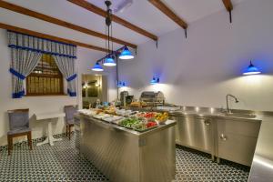a large kitchen with a buffet of food at Istanbul Life Hotel in Istanbul