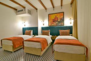 a bedroom with two beds in a room at Istanbul Life Hotel in Istanbul