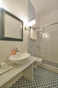a bathroom with a sink and a toilet and a shower at Istanbul Life Hotel in Istanbul +37 photos