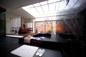 Posezení v ubytování Yen Jim Boutique Motel