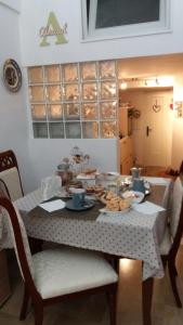 a table with food on it in a kitchen at Almasol in Cassano delle Murge