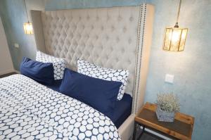 Ένα ή περισσότερα κρεβάτια σε δωμάτιο στο Hey Spreewald Ferienapartments