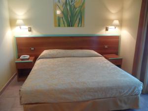 Hotel Parco degli Ulivi客房内的一张或多张床位