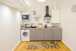 Kuchyňa alebo kuchynka v ubytovaní Pinkova Apartments