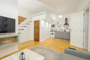 Kuchyňa alebo kuchynka v ubytovaní Pinkova Apartments