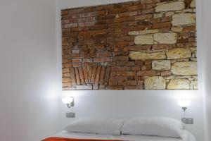 Posteľ alebo postele v izbe v ubytovaní Pinkova Apartments