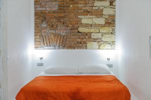 Posteľ alebo postele v izbe v ubytovaní Pinkova Apartments