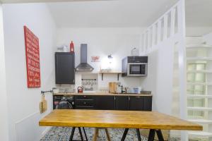 Kuchyňa alebo kuchynka v ubytovaní Pinkova Apartments