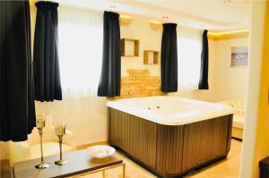 Vannituba majutusasutuses BHB Hotel