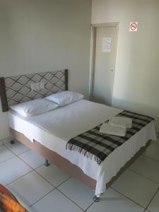 Canoas Hotel客房内的一张或多张床位