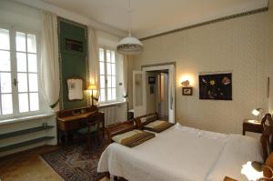 Palazzo Arrivabene B&B tesisinde bir odada yatak veya yataklar