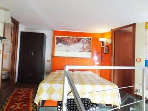 Posteľ alebo postele v izbe v ubytovaní Nolo Loft in Milan