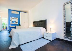 Letto o letti in una camera di Cinqueterre Residence