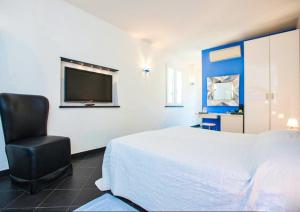 Letto o letti in una camera di Cinqueterre Residence