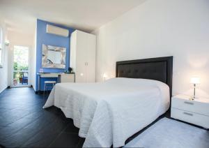 Letto o letti in una camera di Cinqueterre Residence
