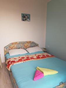 Una cama o camas en una habitación de Apartments Vukovic