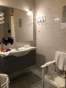 Ett badrum på Ambra Boutique Hotel & Bistro