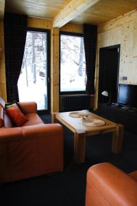 Posezení v ubytování Krakonošova Dílna "WOODHAUS"